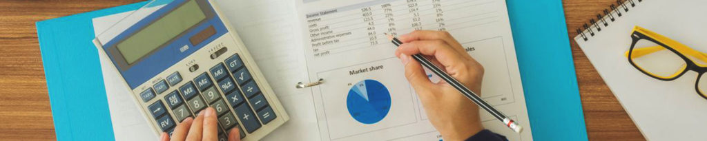 A person is writing on the market share chart.